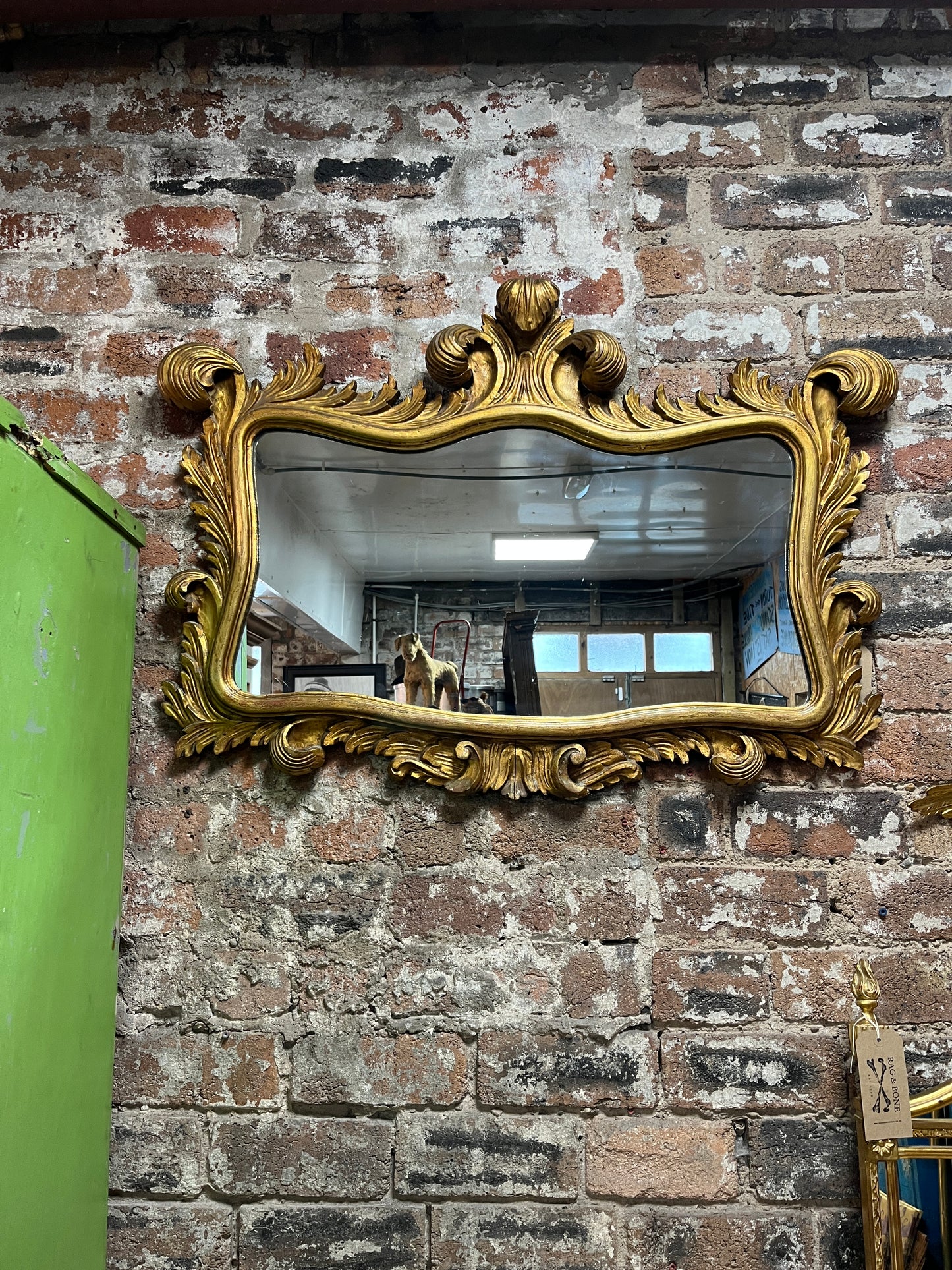 Dramatic Gold Mirror with Rococo Feather Type Mouldings