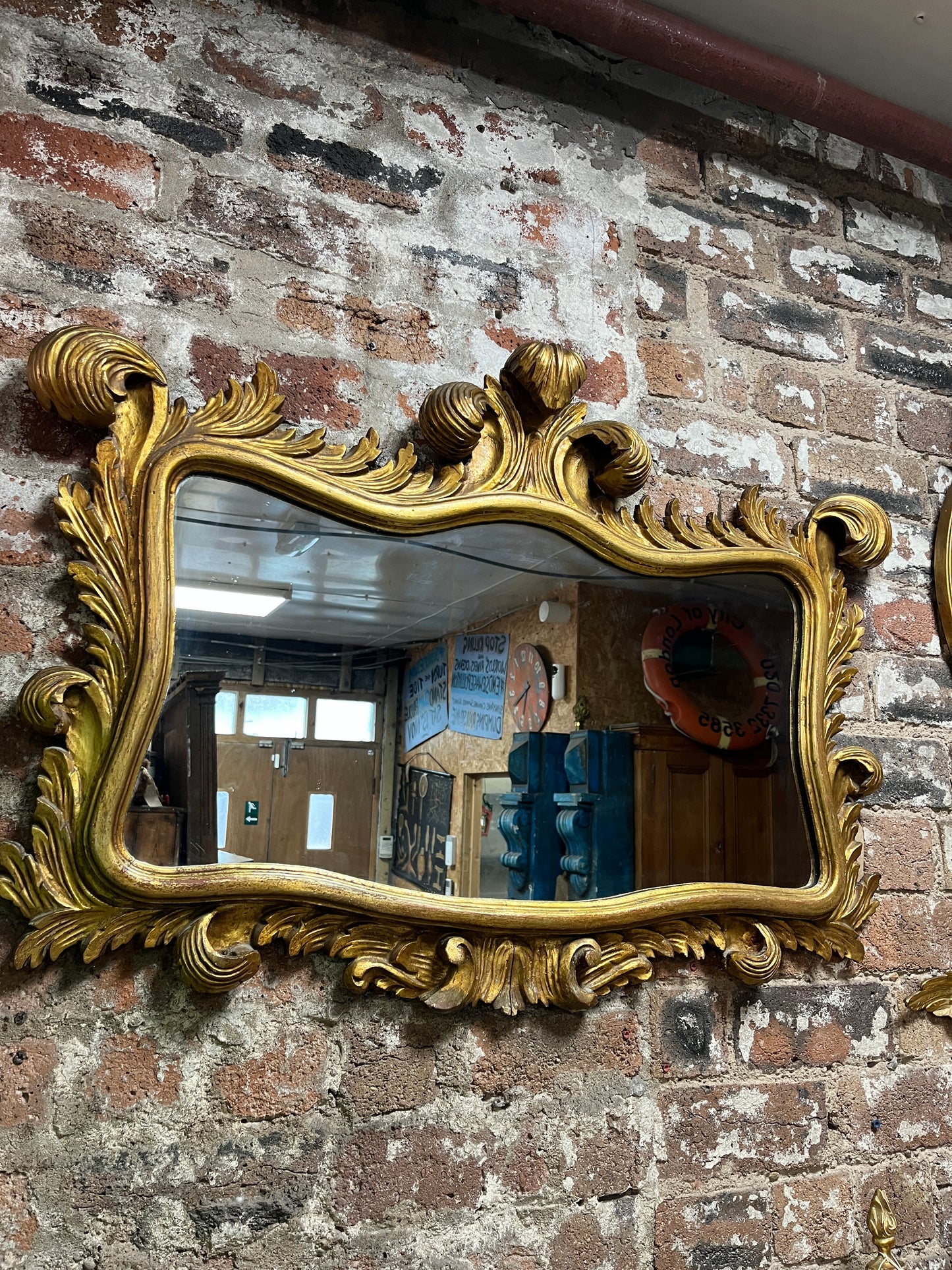 Dramatic Gold Mirror with Rococo Feather Type Mouldings