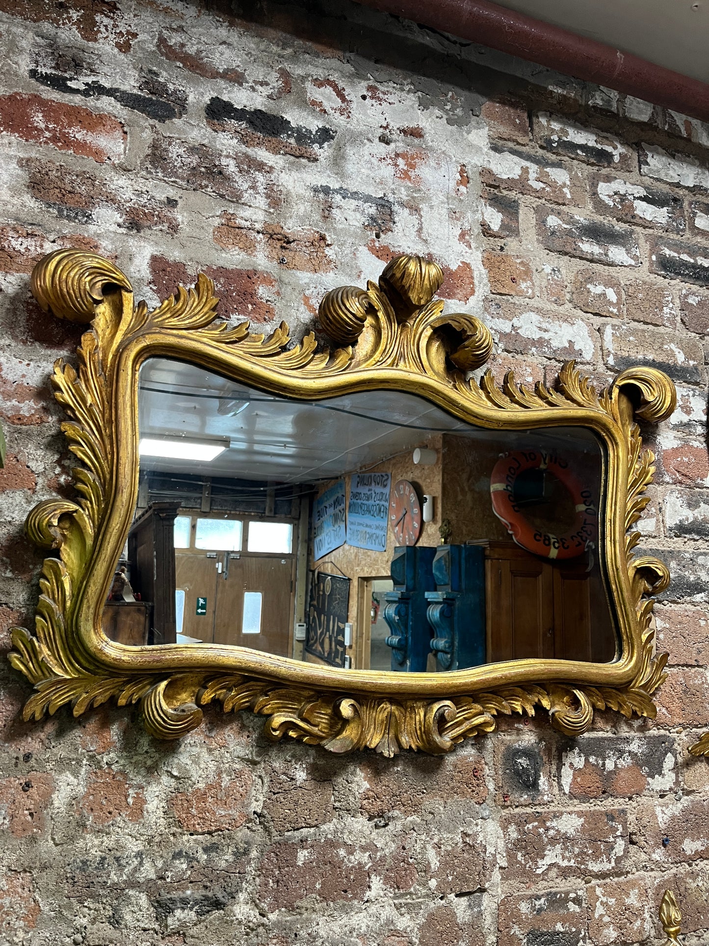 Dramatic Gold Mirror with Rococo Feather Type Mouldings