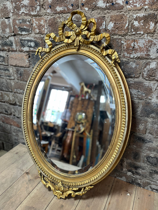 French 19th Century Oval Gilded Mirror