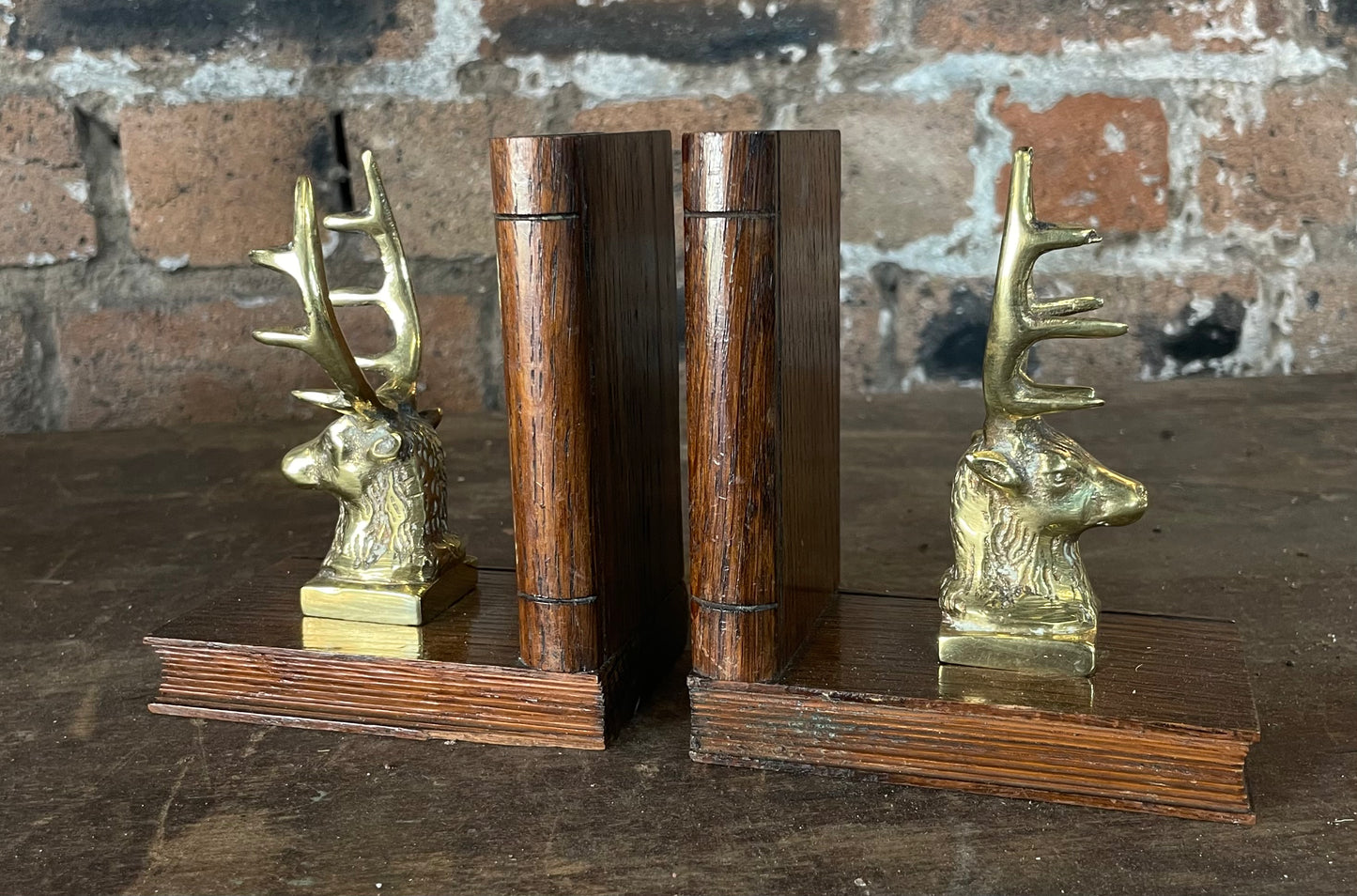 Pair of 19th Century Brass Stag Bookends on Carved Wood