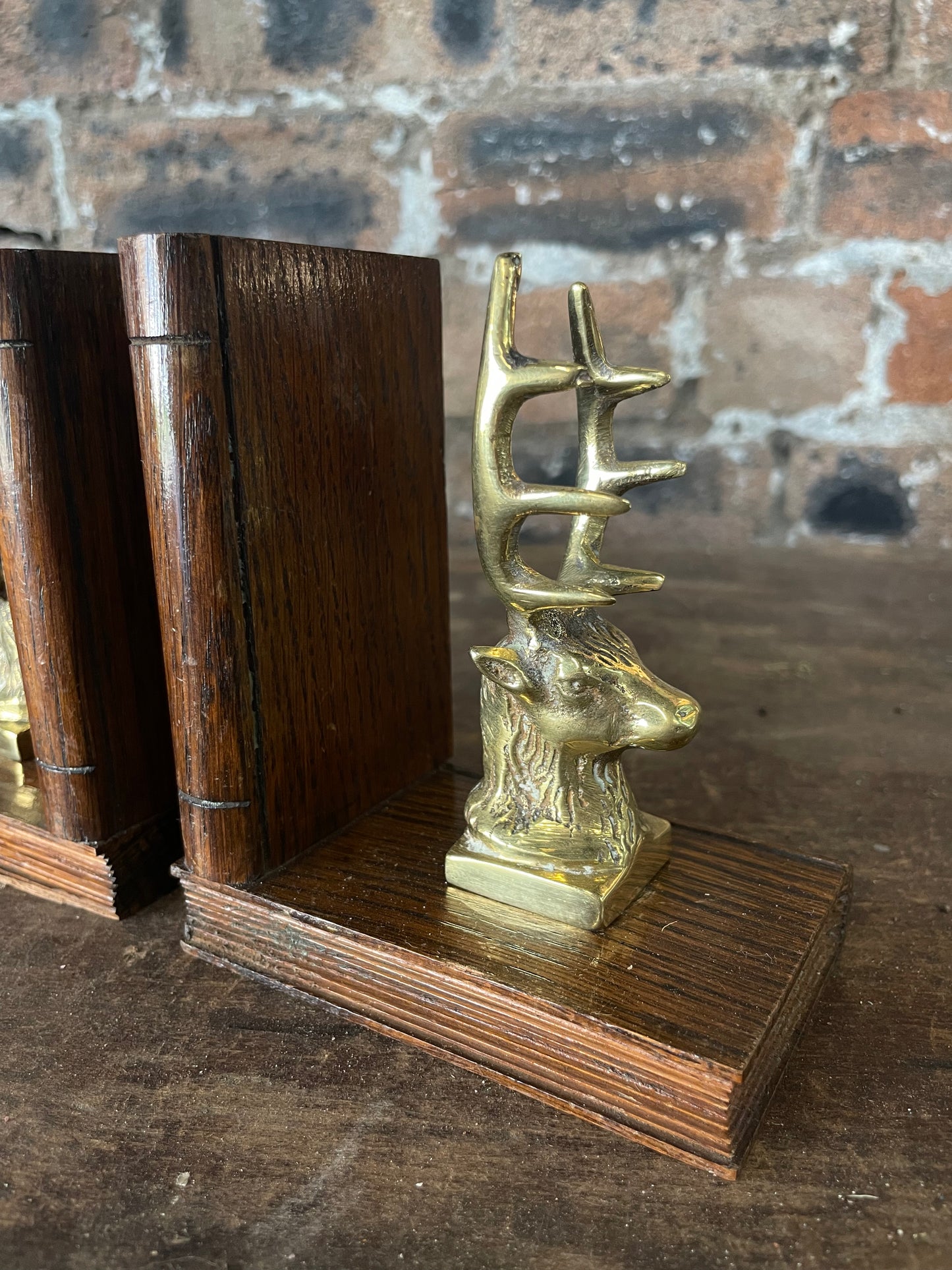 Pair of 19th Century Brass Stag Bookends on Carved Wood