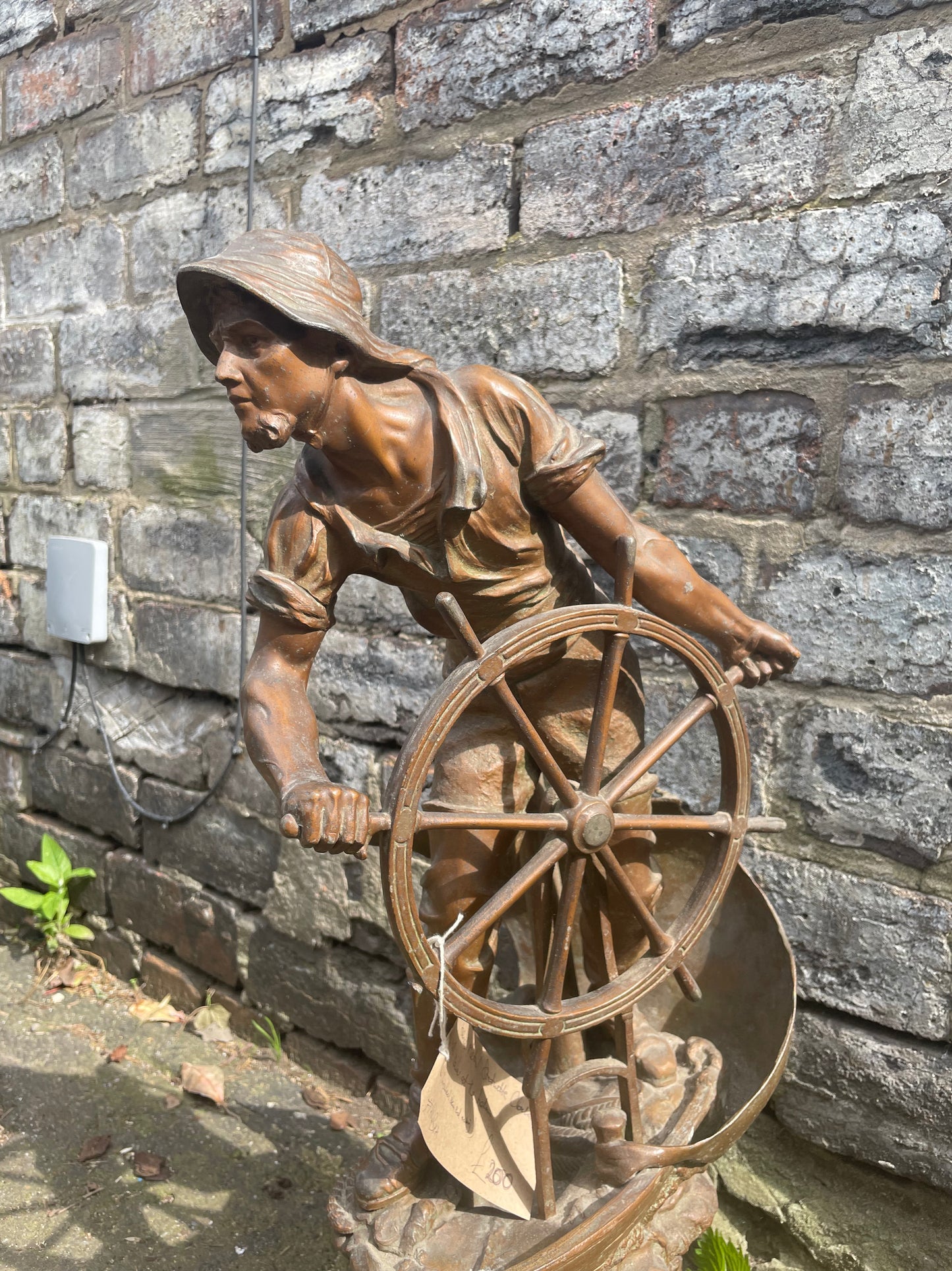 French Art Nouveau bronze statuette clock with a sailor at the helm. Circa 1911