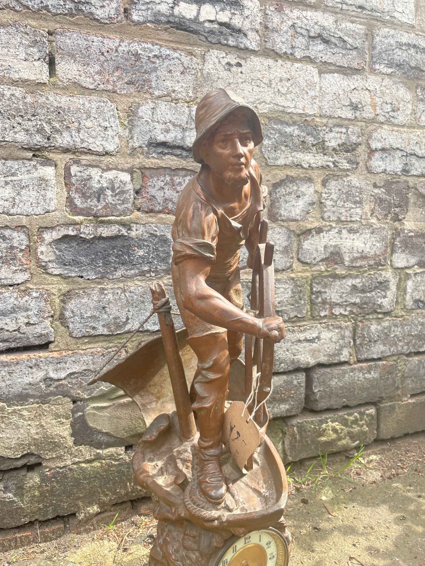 French Art Nouveau bronze statuette clock with a sailor at the helm. Circa 1911