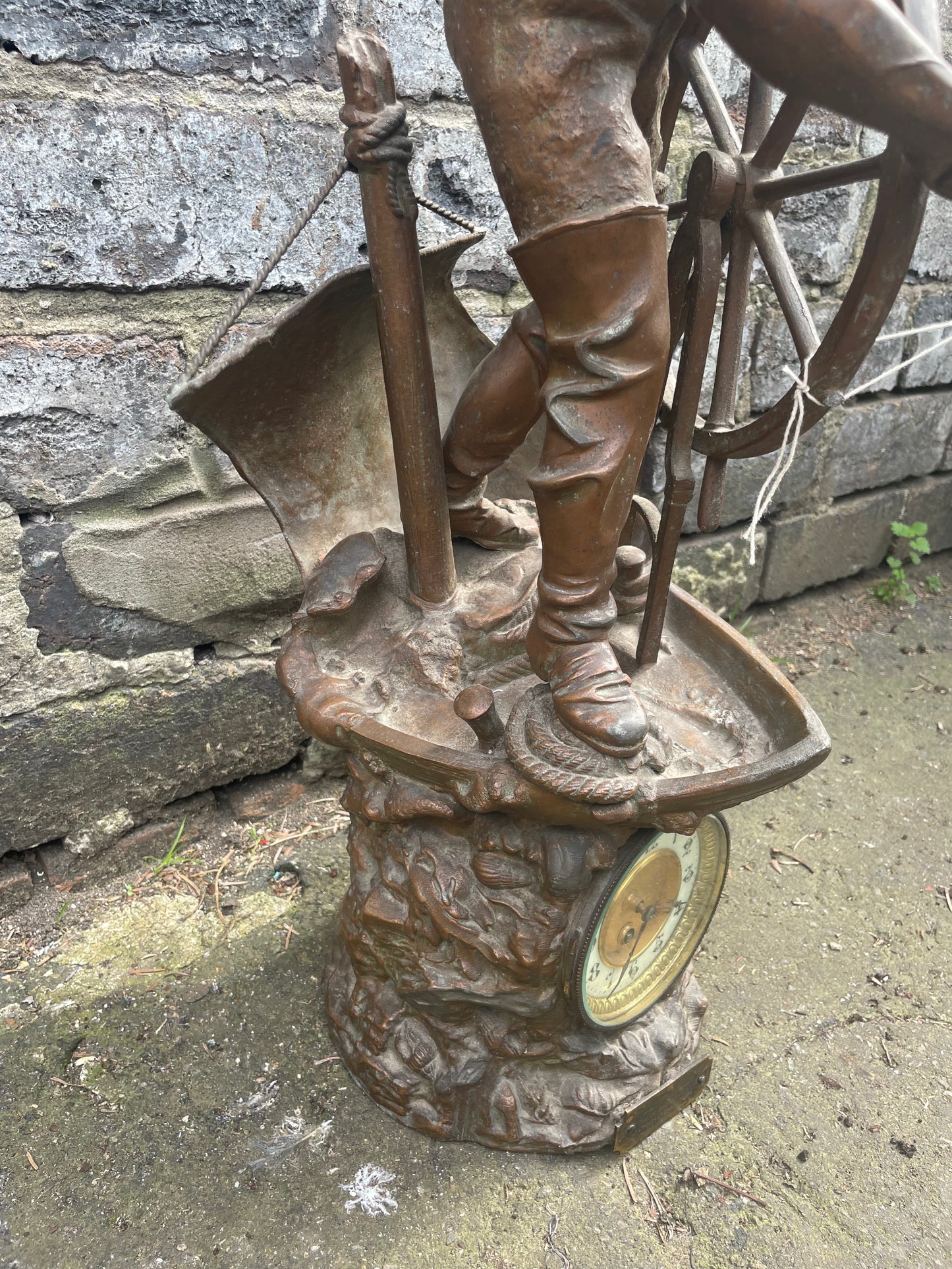 French Art Nouveau bronze statuette clock with a sailor at the helm. Circa 1911