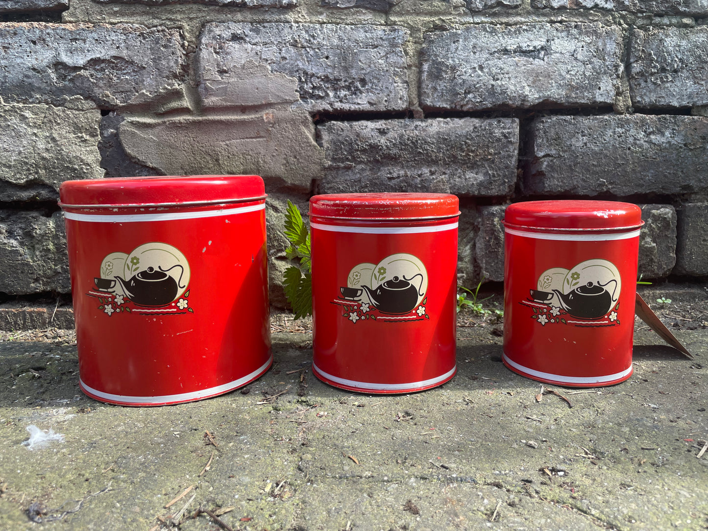 Vintage Red Tin Canisters with Kettle and Teacup Graphics. Circa 1940's