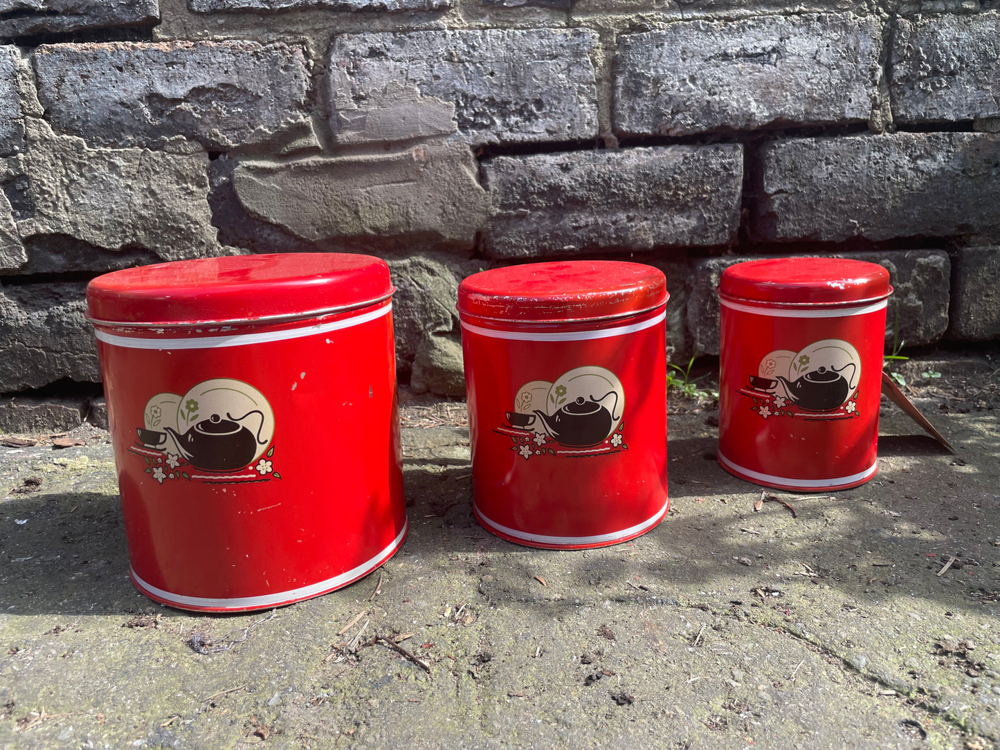 Vintage Red Tin Canisters with Kettle and Teacup Graphics. Circa 1940's