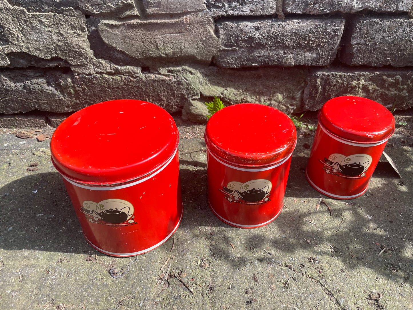 Vintage Red Tin Canisters with Kettle and Teacup Graphics. Circa 1940's