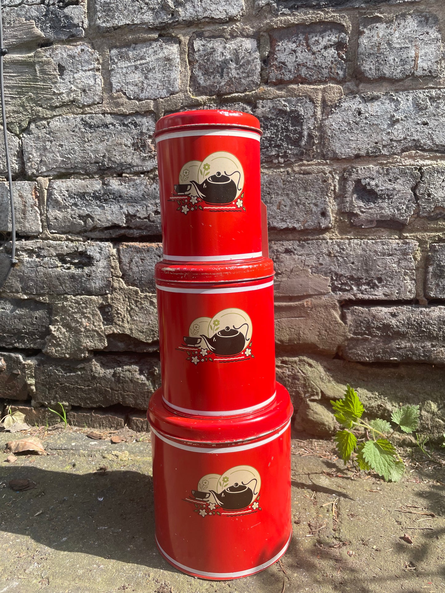 Vintage Red Tin Canisters with Kettle and Teacup Graphics. Circa 1940's
